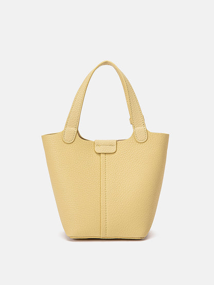 PAZZION, Haley Leather Charmed Bucket Bag, Yellow